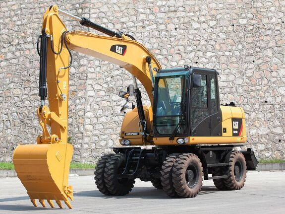 Аренда колесного экскаватора Caterpillar M315D2 с грейфером